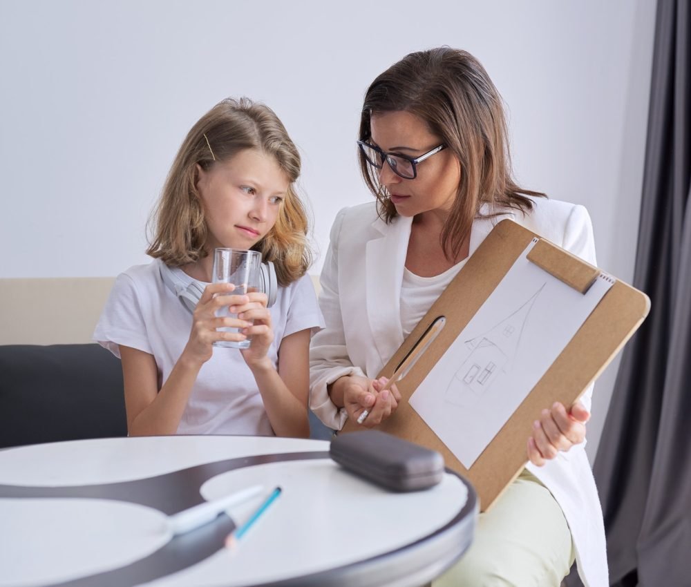 professional-counseling-for-children-psychologist-looks-at-childs-drawing.jpg professional-counseling-for-children-psychologist-looks-at-childs-drawing.jpg